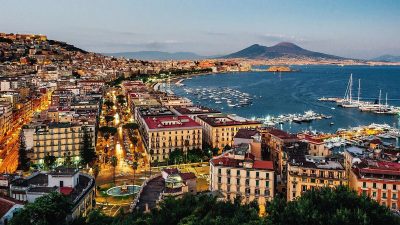Naples and its port in the evening